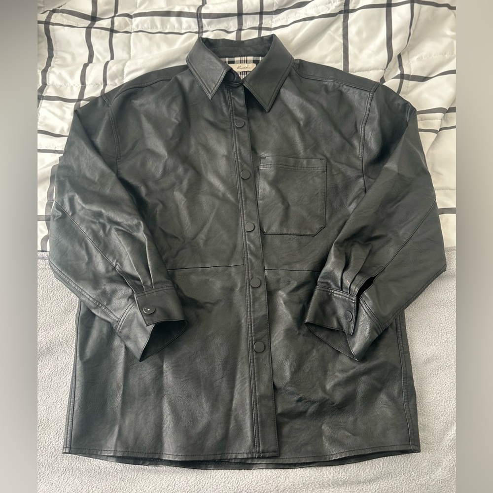 Black leather jacket with plaid lining